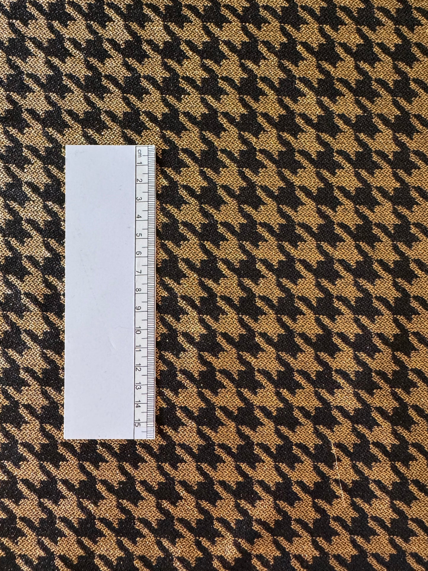 Black and gold houndstooth fabric - L: 1.30 m