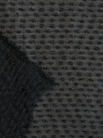 Tissu au mètre, Organza tissé avec des fils texturés noir